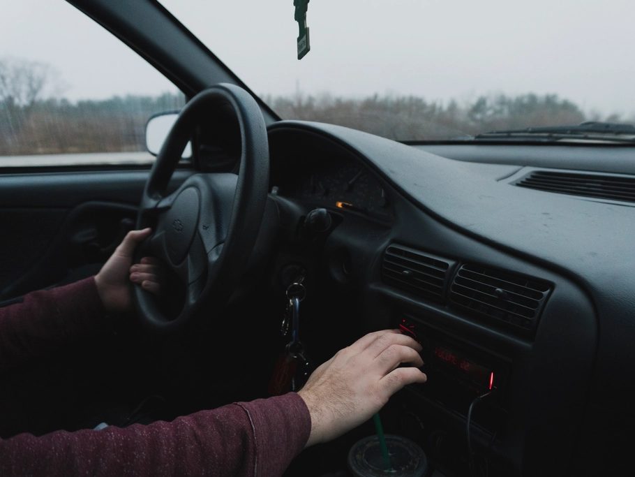The driver's seat and steering wheel, seen from the passenger seat